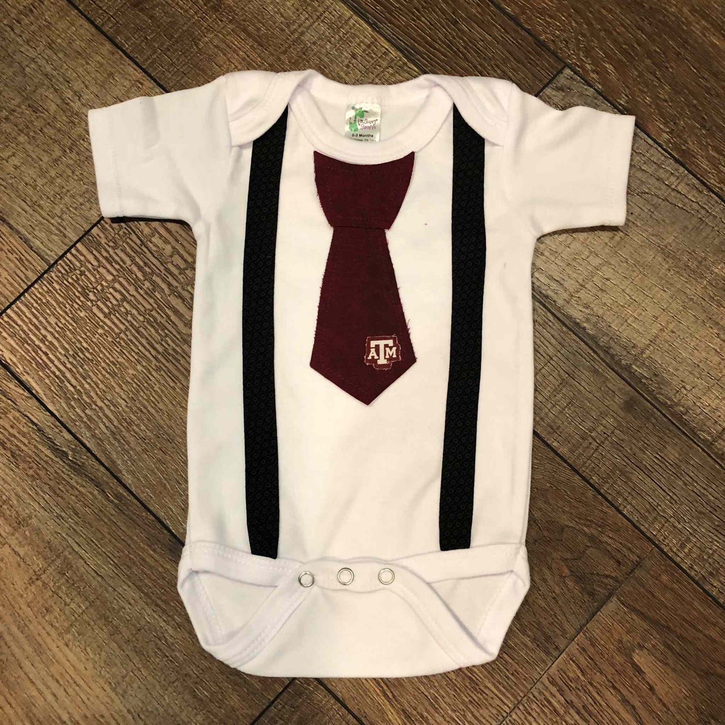 A&M Tie Onesie