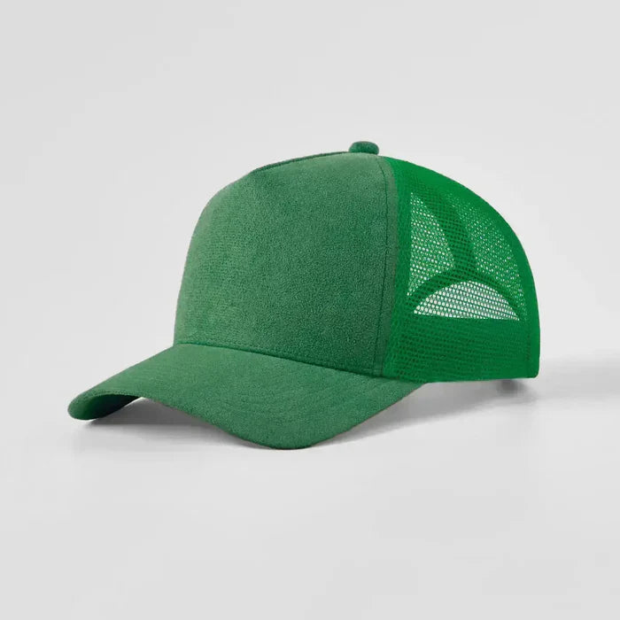 Green baseball cap with mesh back on a light gray background