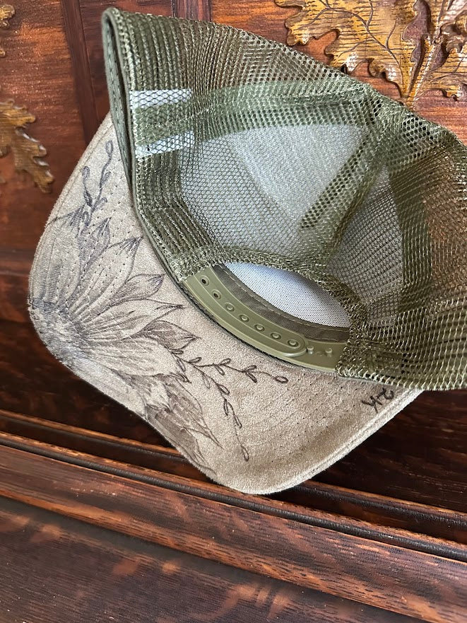 Green mesh cap on a wooden surface