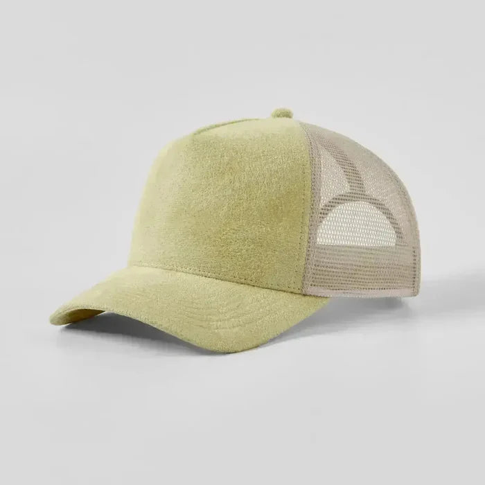 Green mesh cap on a light gray background