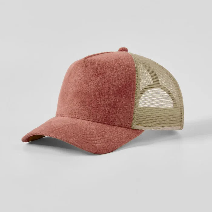 Two-tone red and beige cap on a light gray background