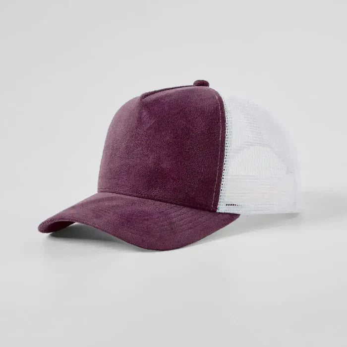 Purple and white trucker cap on a light gray background